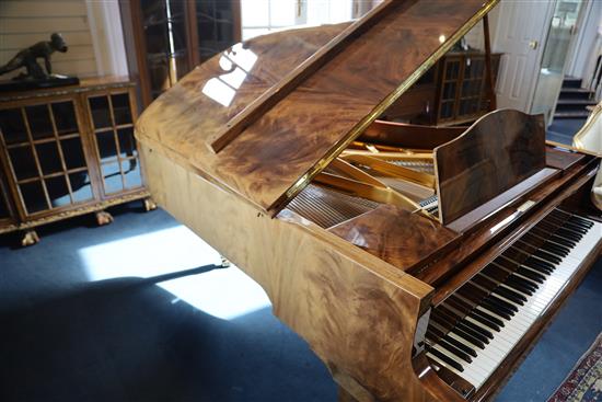 A Bluthner Model 6 flame mahogany cased grand piano, W.4ft 10in. L.6ft 3in. H.3ft 3in.